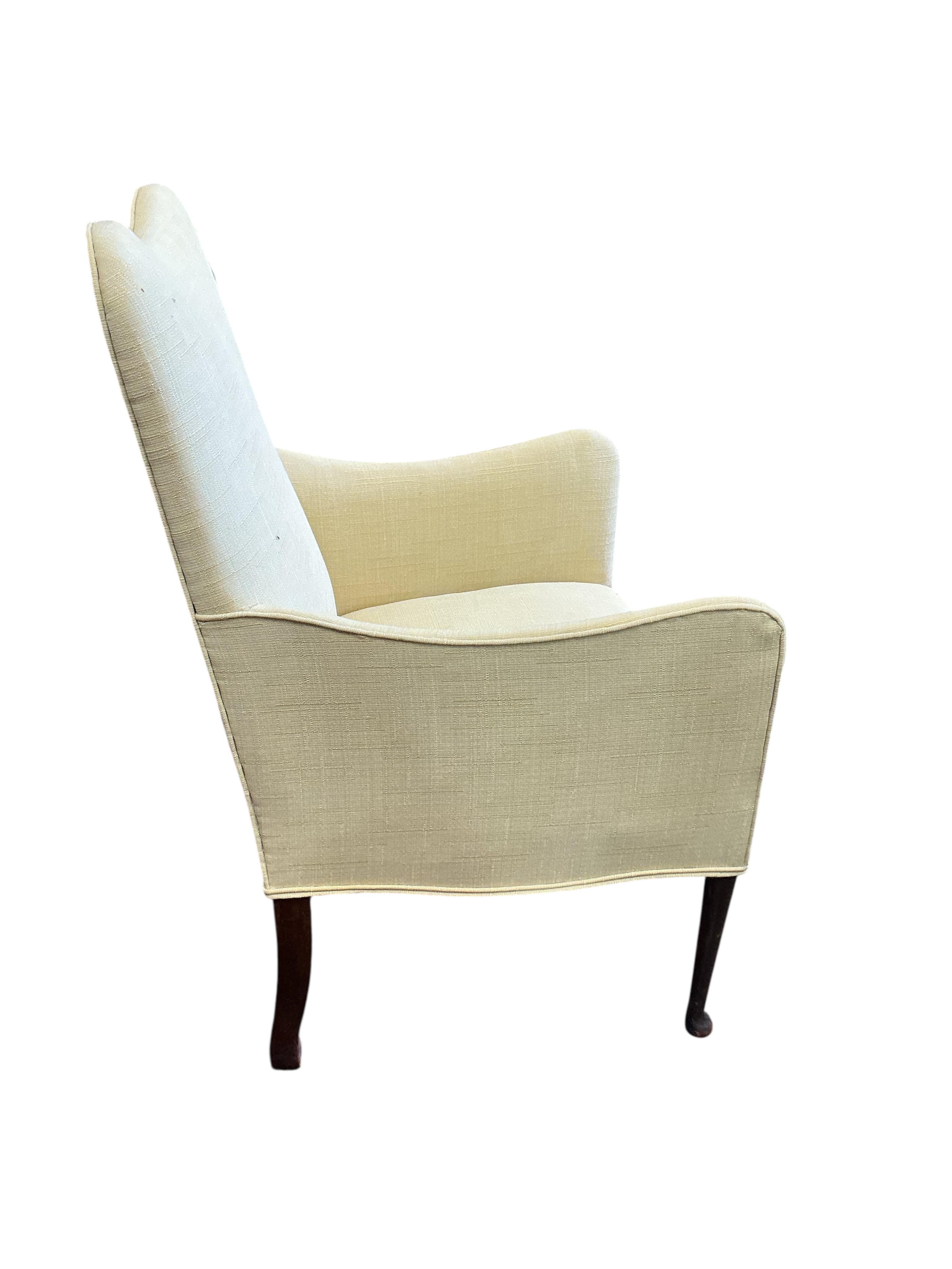 An Edwardian upholstered armchair, width 62cm, depth 64cm, height 98cm